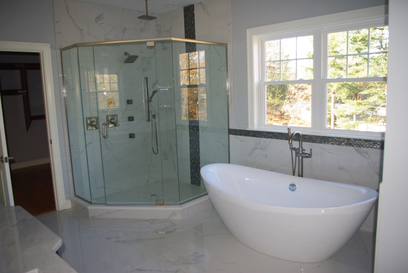 Freestanding bathtub and custom shower remodel